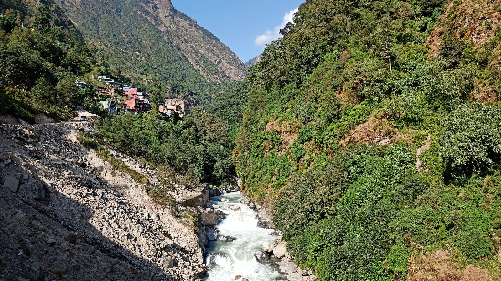 The Bhote Koshi river running through a steep green valley near Tatopani in Nepal